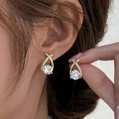 Earrings with golden cross and zirconia