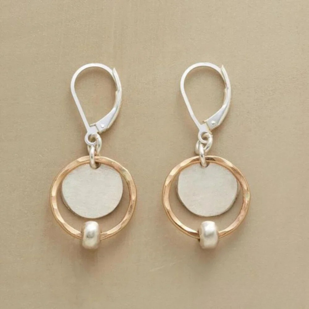 Chic earrings made of gold and silver with pearls