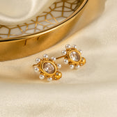 Elegant gold earrings with pearl