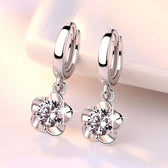 Sterling silver earrings with purple and white zirconia